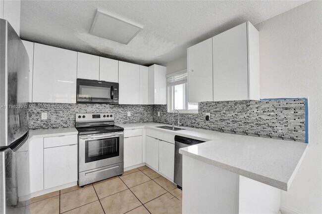 Building Photo - 1154 NW 103rd St