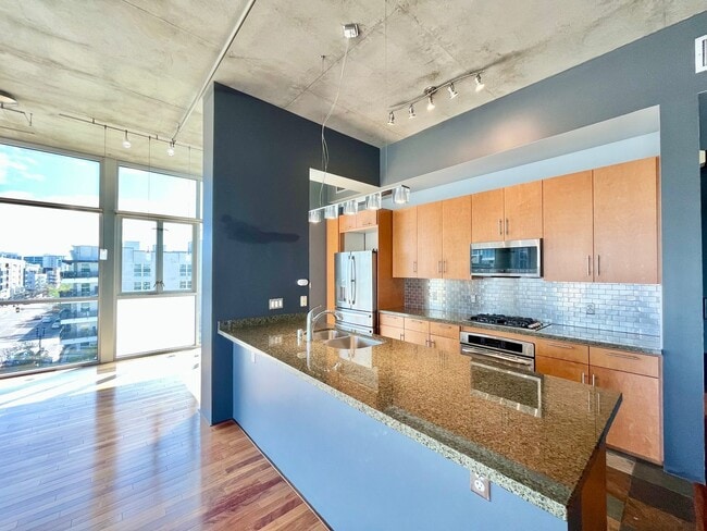 Building Photo - Stunning Corner Loft in East Village with Floor-to-Ceiling Windows & City Views!