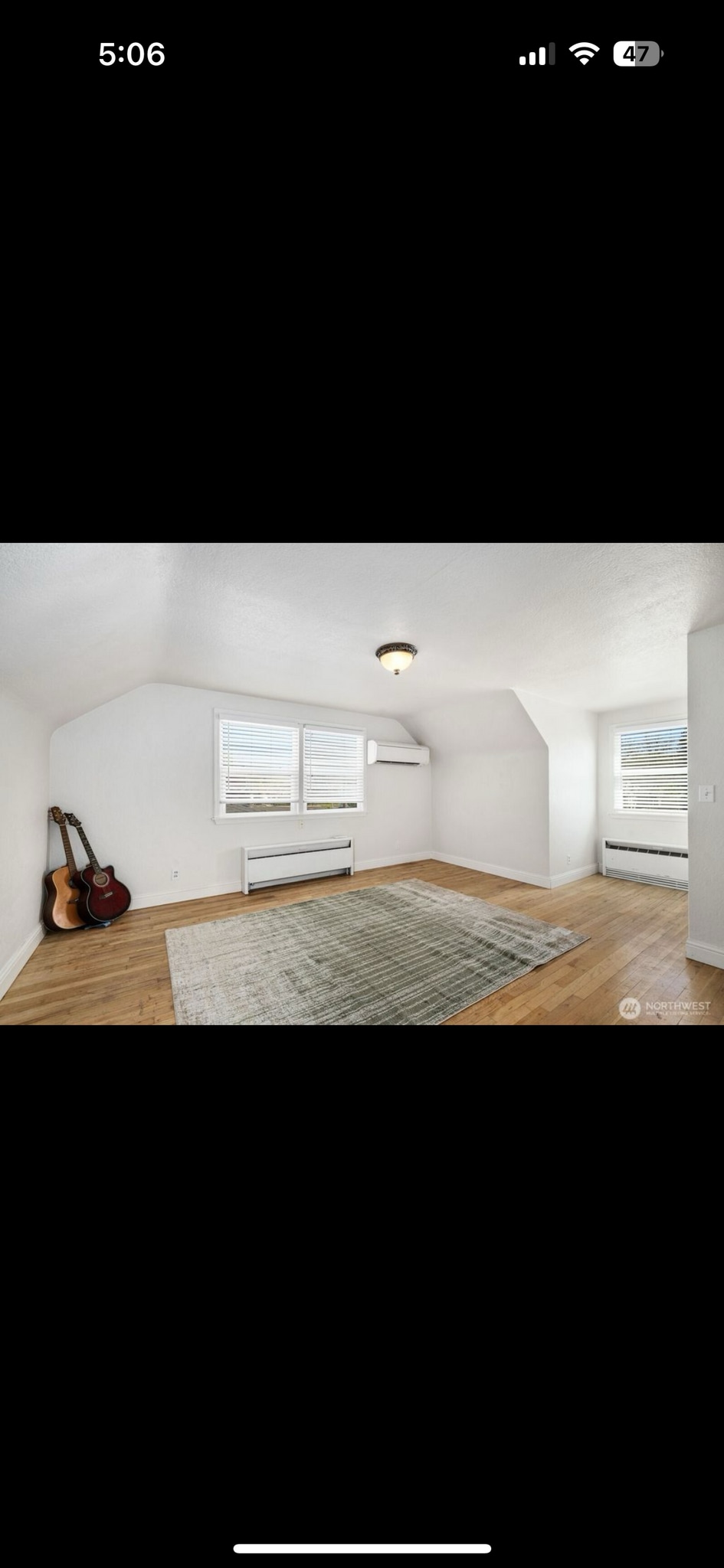 Upstairs living room/ primary sweet with updated heating and cooling - 520 S Wilbur Ave