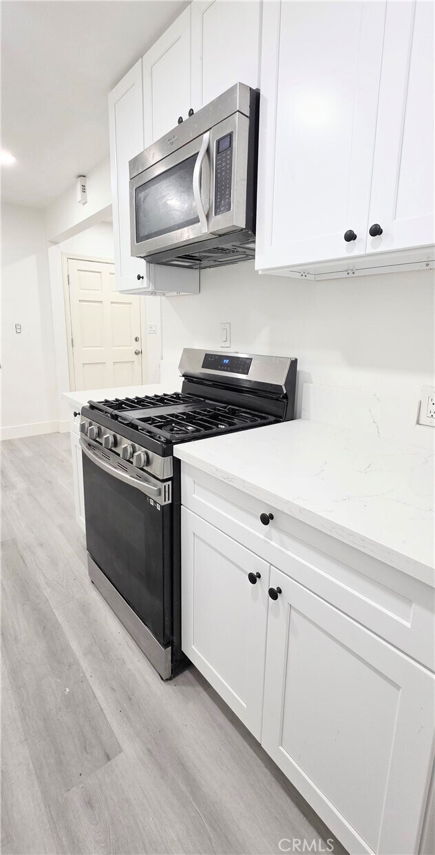 Building Photo - 10527 Western Ave