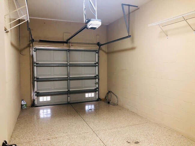 Building Photo - Experience Bell Tower Park. GATED ground floor 2 Bed 2 Bath Den 1 Car Garage Condo.