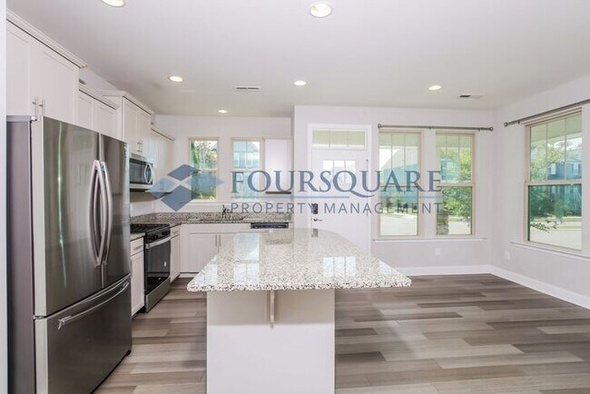 Building Photo - Stylish End-Unit Townhome with Open Floor Plan, Modern Kitchen & 1-Car Garage – Wendell, NC
