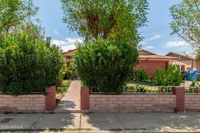 Building Photo - 3316 N 63rd Ave