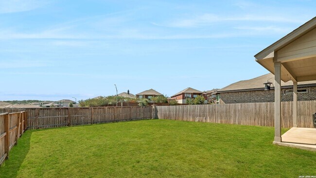 Building Photo - 6410 Comanche Sky