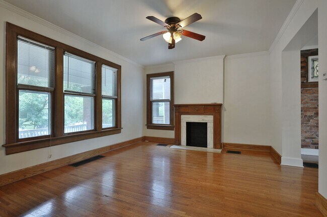 Building Photo - Charming 5-Bedroom Home with Exposed Brick and Modern Upgrades