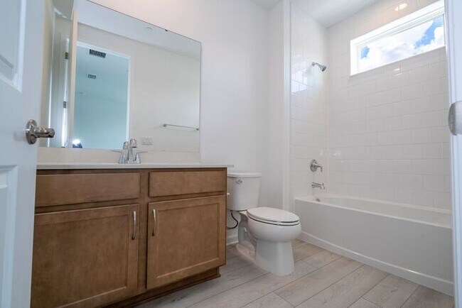 Building Photo - Modern 3-Bedroom 3.5-Bath Townhome with EV Charger, Smart Home Features, 2-Car Garage & Resort-St...