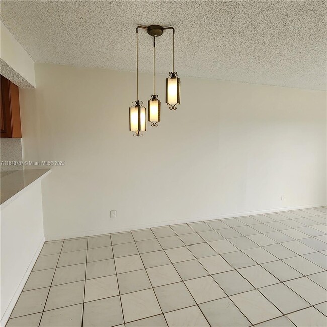 Building Photo - 8550 N Sherman Cir