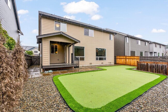 Building Photo - Backyard Putting Green + Outdoor Fireplace | Comfortable Puyallup Rental