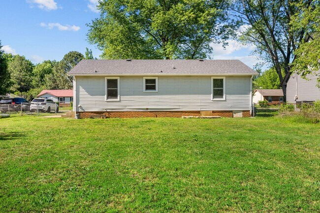 Building Photo - Spacious Yard + Fresh Interior Updates!