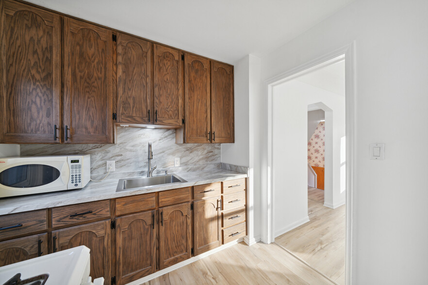 Kitchen. Appliances to be updated prior to move-in. - 16079 Forest Ave