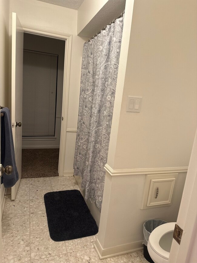 Shower & restroom with vanity attached to bedroom 3. - 4806 Havenwoods Dr