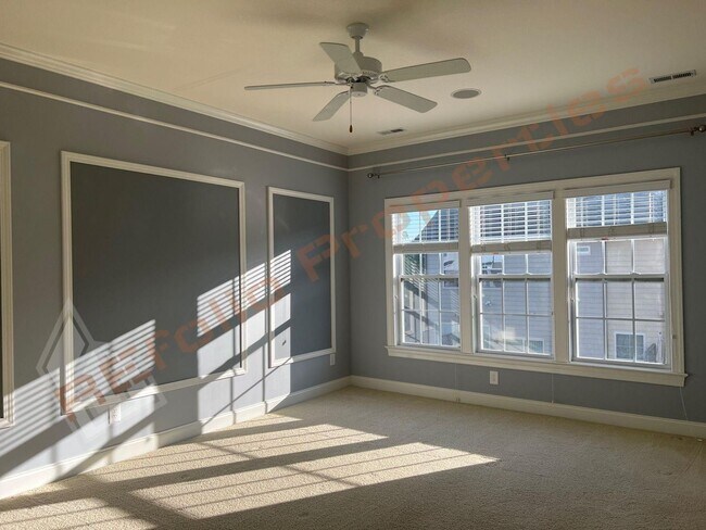 Building Photo - Elegant 3 Story 3 Bedroom Formal Model Tow...