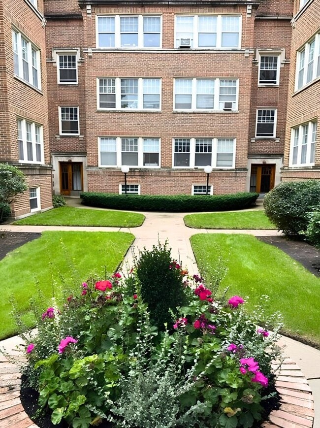 Building Photo - 5648 N. Ridge Unit 2W