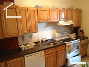 Building Photo - No Brokers Fee, Large Unit Steps from the T, Heat, Hot Water Included, Porch, Parking for Rent