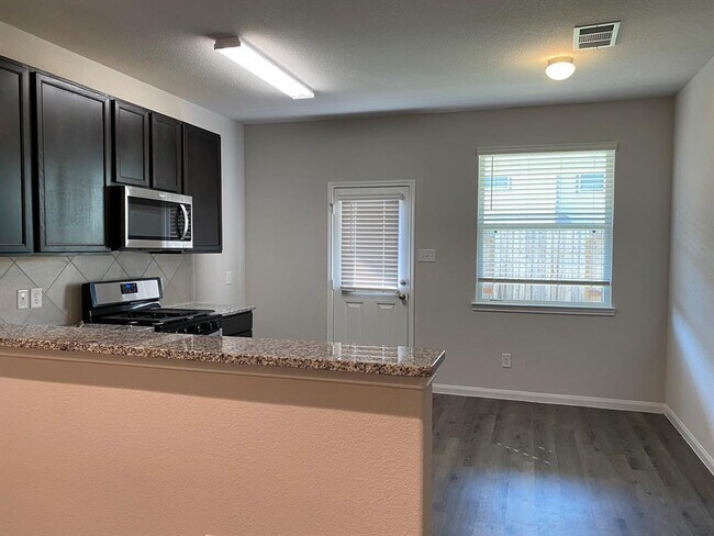 Building Photo - 4919 Blue Jacaranda Wy