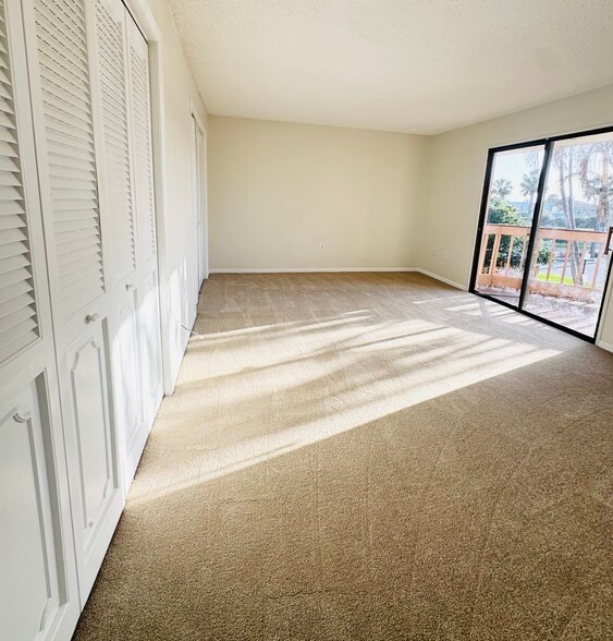 Primary Bedroom Double Closets - 200 S Banana River Blvd