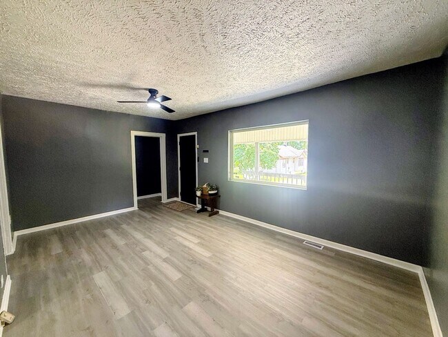 Building Photo - Three bedroom one bathroom single-family home for rent