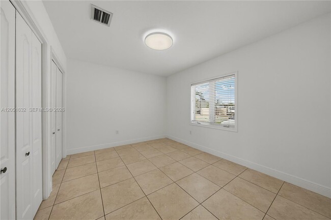 Building Photo - 7515 NW South River Dr