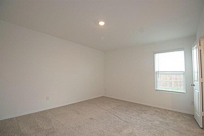 Building Photo - 5701 Manarchos Ln