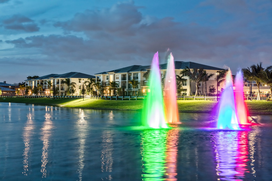 Lake with illuminated fountains - The Reserve at Coral Springs