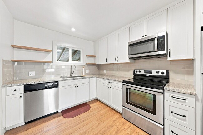Building Photo - 3/1 Charmer in the Garden Tract - Dog Friendly