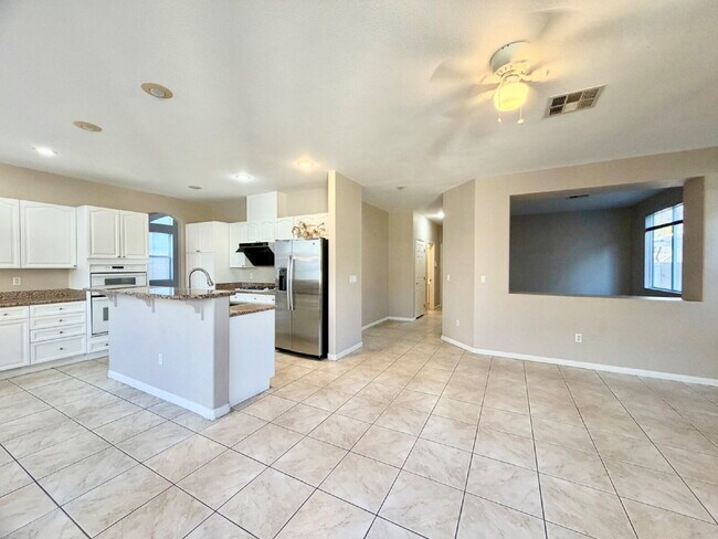 Building Photo - GATED SUMMERLIN HOME | 5 BEDROOM + DOWNSTAIRS DEN | 3-CAR GARAGE