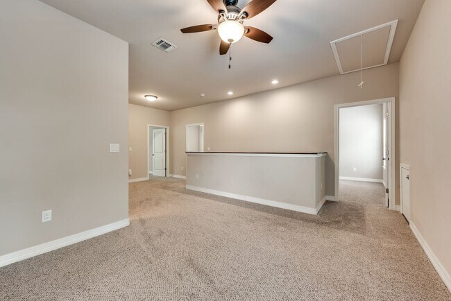 Building Photo - AVAILABLE NOW 4 BEDROOM 2.5 BATH HOME IN A...