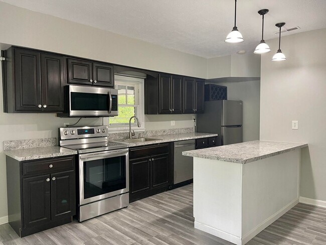 Building Photo - Move-In March & Get 50% Off Your First Month! Charming 2-Bed Northside Home!