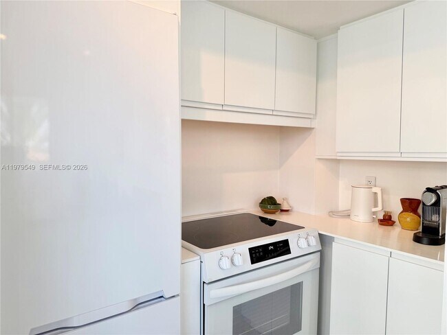 Building Photo - 8911 Collins Ave