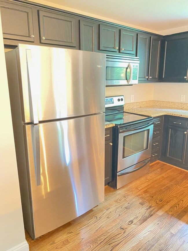 Building Photo - **Application pending 5/1/2026**Stunning Carrboro Condo available early June!