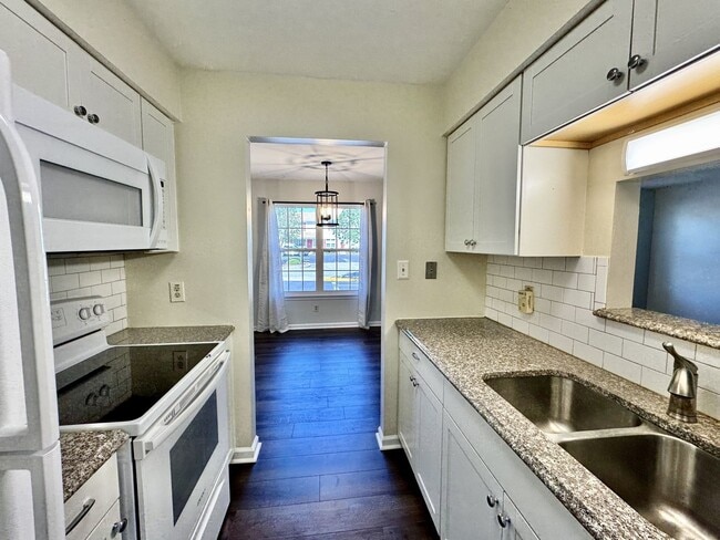 Building Photo - Just Updated & Ready NOW! A Pet Friendly H...