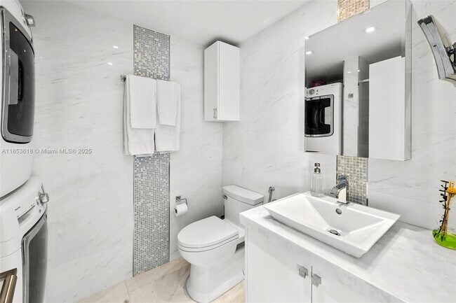 Building Photo - 4779 Collins Ave