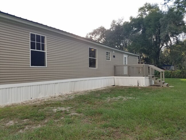 Building Photo - 3 bed, 2 bath w/ Front & Back Decks, 1/4 Acre of land, FENCED backyard