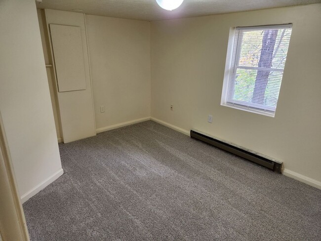 Building Photo - Affordable Apartment Outside the City Limits