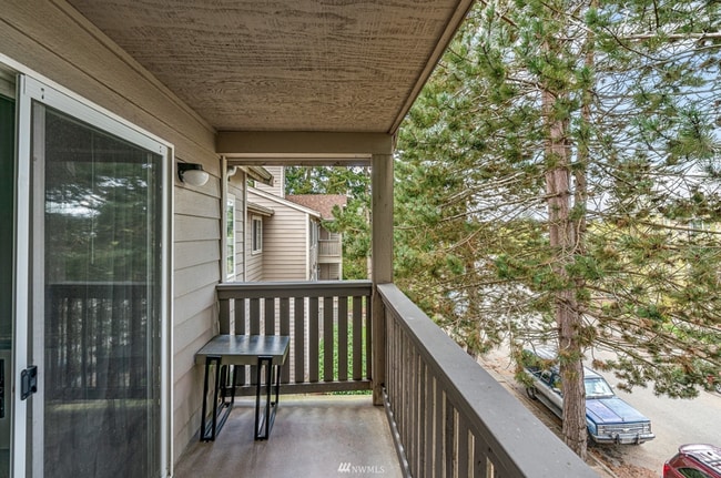 Building Photo - 2BR Condo w/ Vaulted Ceilings, W/D, Parking & Amenities | Utilities Included