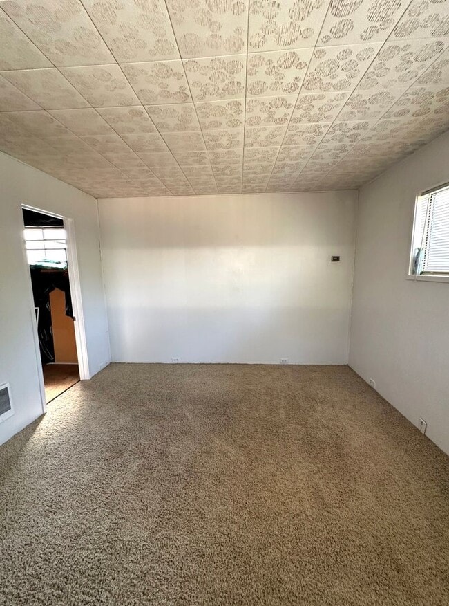 Building Photo - Cutest 3-Bedroom House with Covered Back Patio + Bonus Storage/Office!