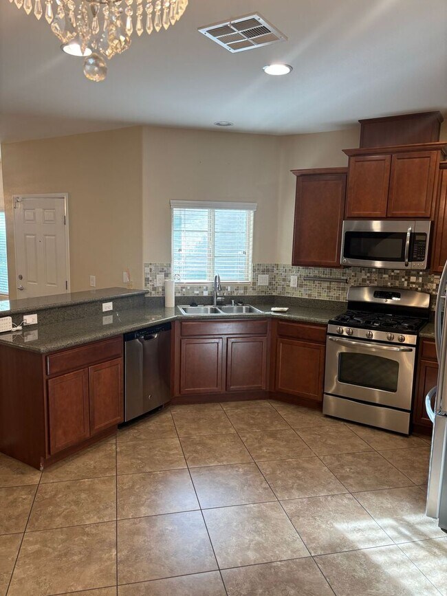 Building Photo - Gated 3-Bedroom Home with Community Pool Near Fort Apache & Blue Diamond