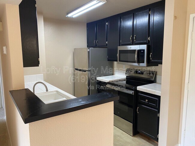 Building Photo - 7130 Shoreline Dr