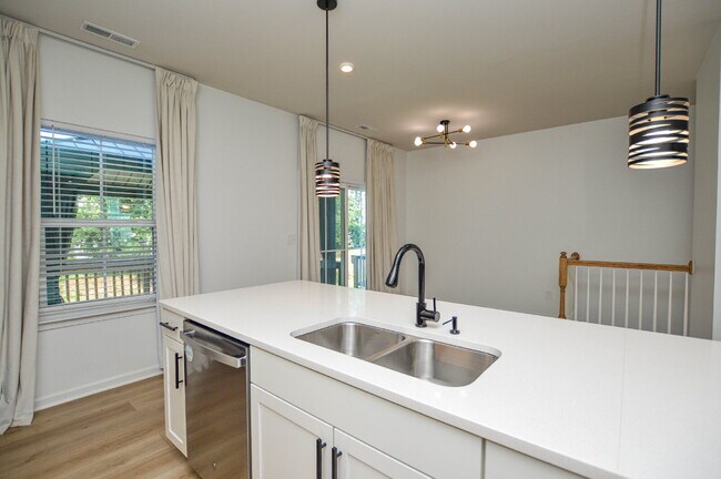 Building Photo - 3 Bedrooms | 2.5 Bathrooms | Lower-Level Flex Room | Approximately 1,978 Square Feet | 2-Car Gara...