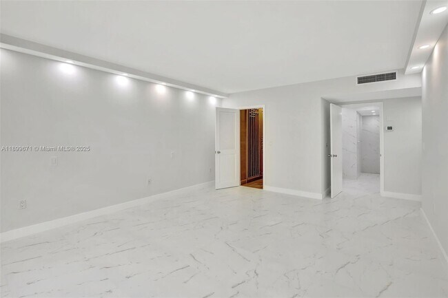 Building Photo - 9801 Collins Ave