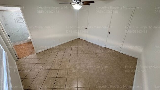 Building Photo - 3 bedroom 2 bathroom home on a corner lot with extra fenced parking.