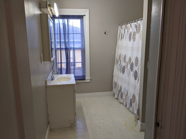 in living room looking into bathroom - 426 Elm St