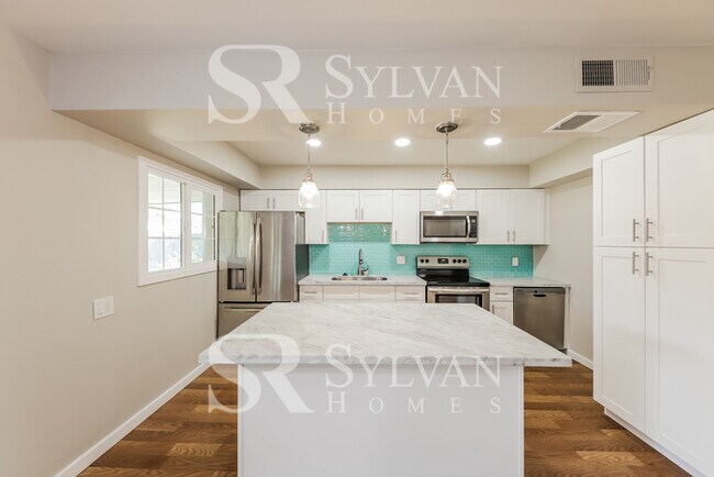 Building Photo - This lovely home is ready for your personal touch!