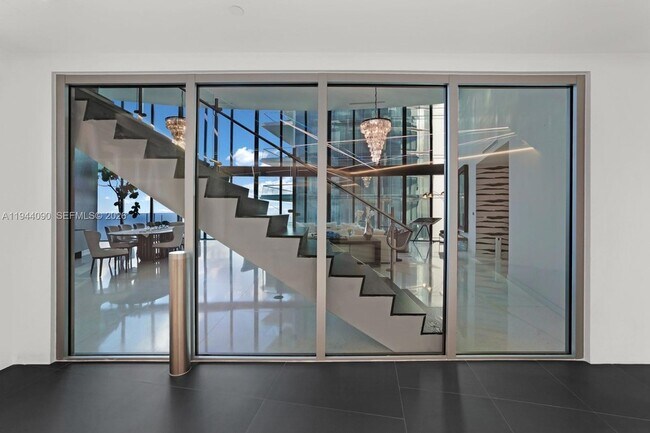 Building Photo - 18555 Collins Ave