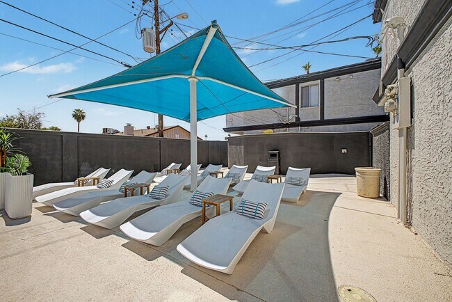 Building Photo - Spacious 2 Bed + Bonus Room | Large Private Yards | Covered Parking | 8 Weeks Free Rent!