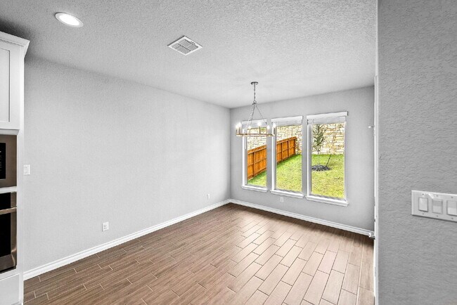 Building Photo - Rare Cibolo Canyons Opportunity | Guest Suite Downstairs, Optional 5th Bedroom, No Carpet, No Rea...