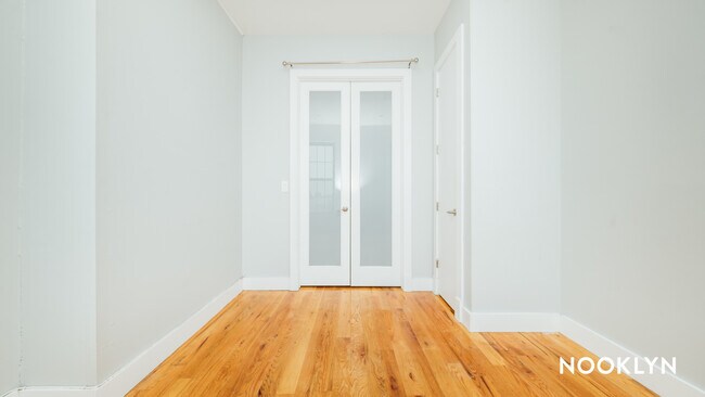 Bed 1 / Closet Front - 1048 Wyckoff Ave