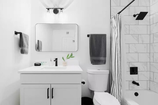 Building Photo - 8447 E Vernon Ave