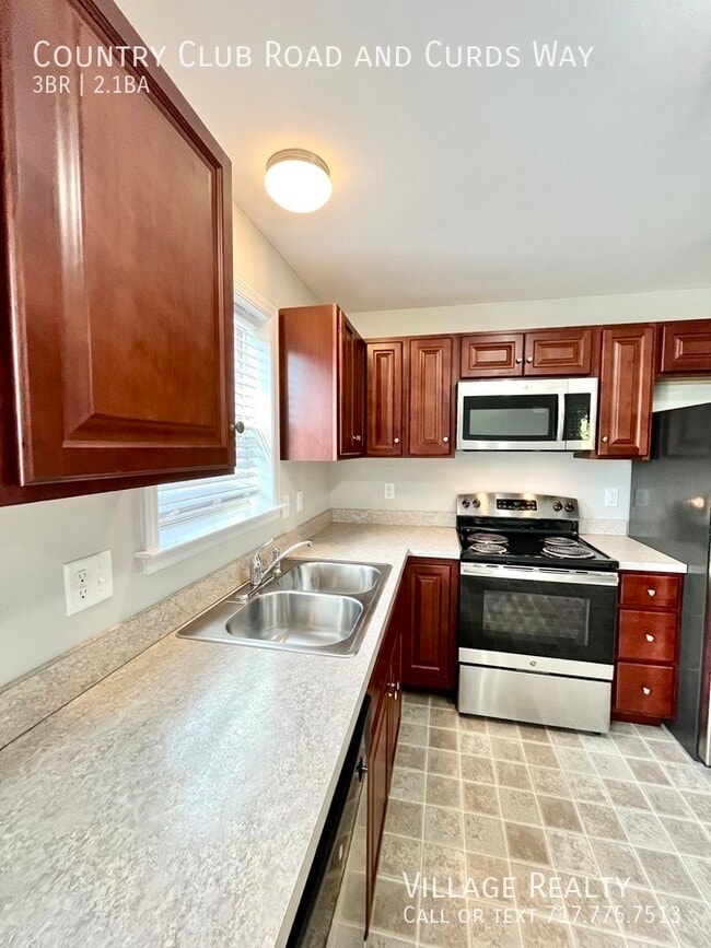 Building Photo - 703 Country Club Rd