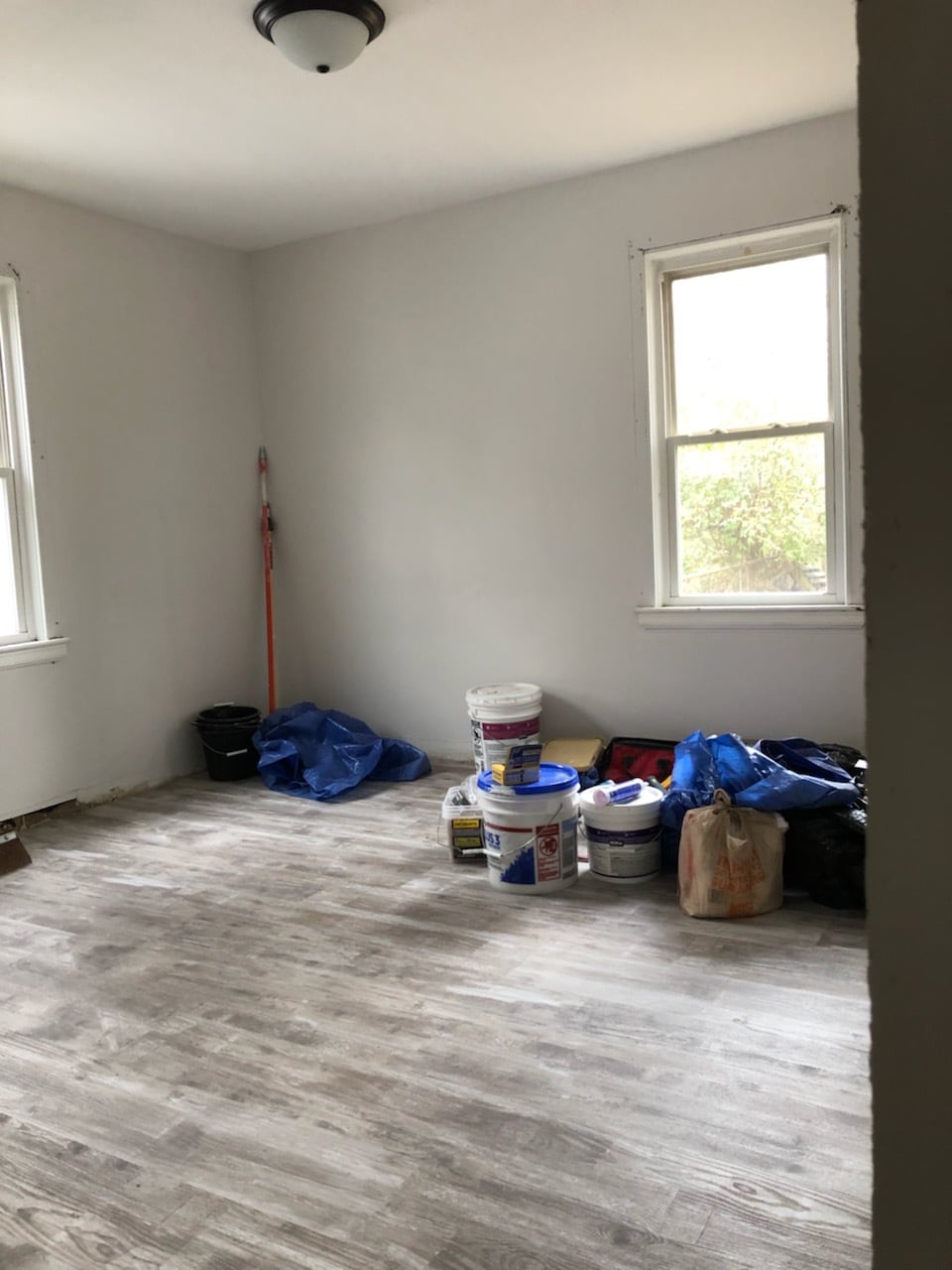 Reno update: Back Bedroom; highlighting floors and layout. What's next? Paint touch ups, new trim, new baseboards, new counter tops, and new doors. - 1395 Ross Ave